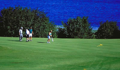 Golfers by the Water